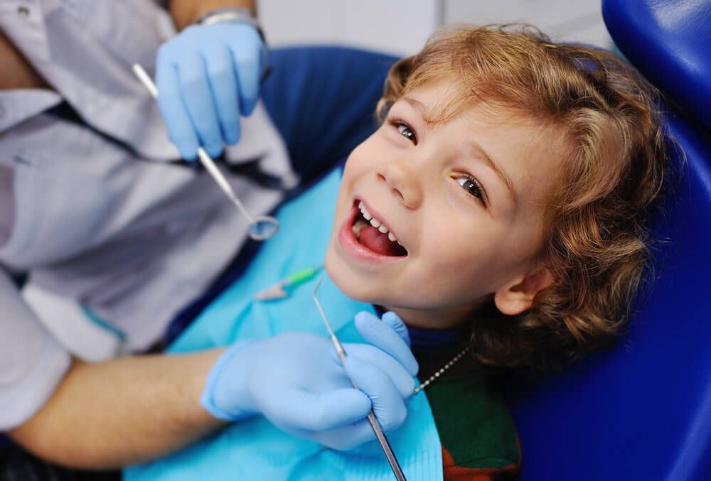 Little boy during his dental appointment