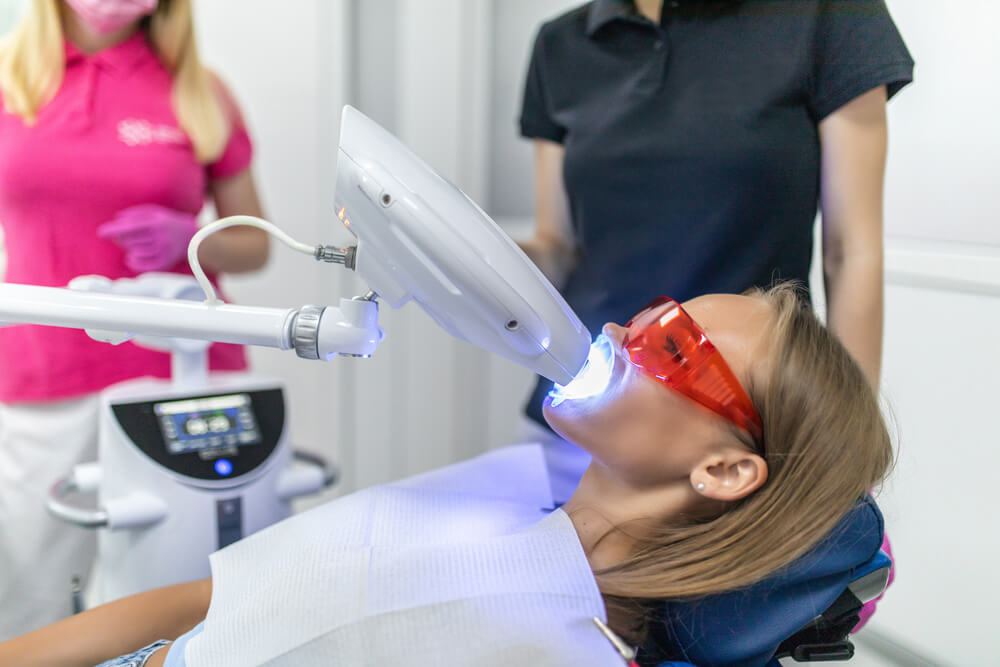 Austin woman getting express laser teeth whitening