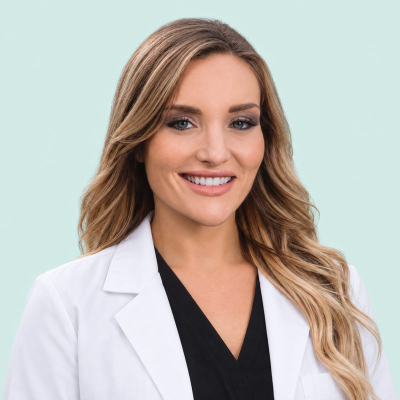 Portrait of Dr. Kimberley Barclay in a white coat